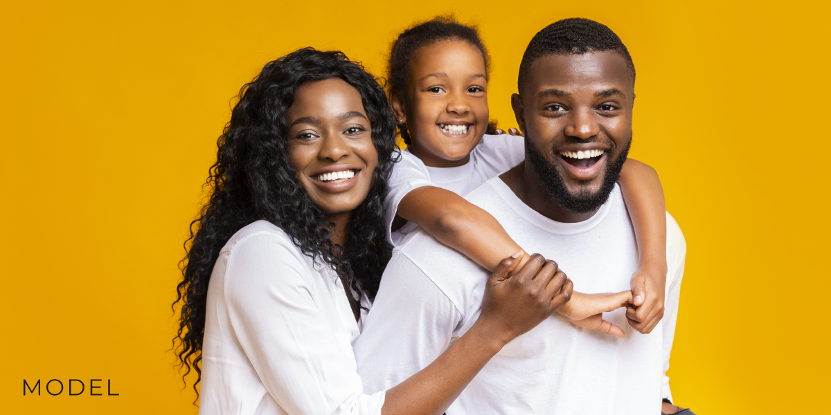 Family of Models Against a Yellow-Orange Background