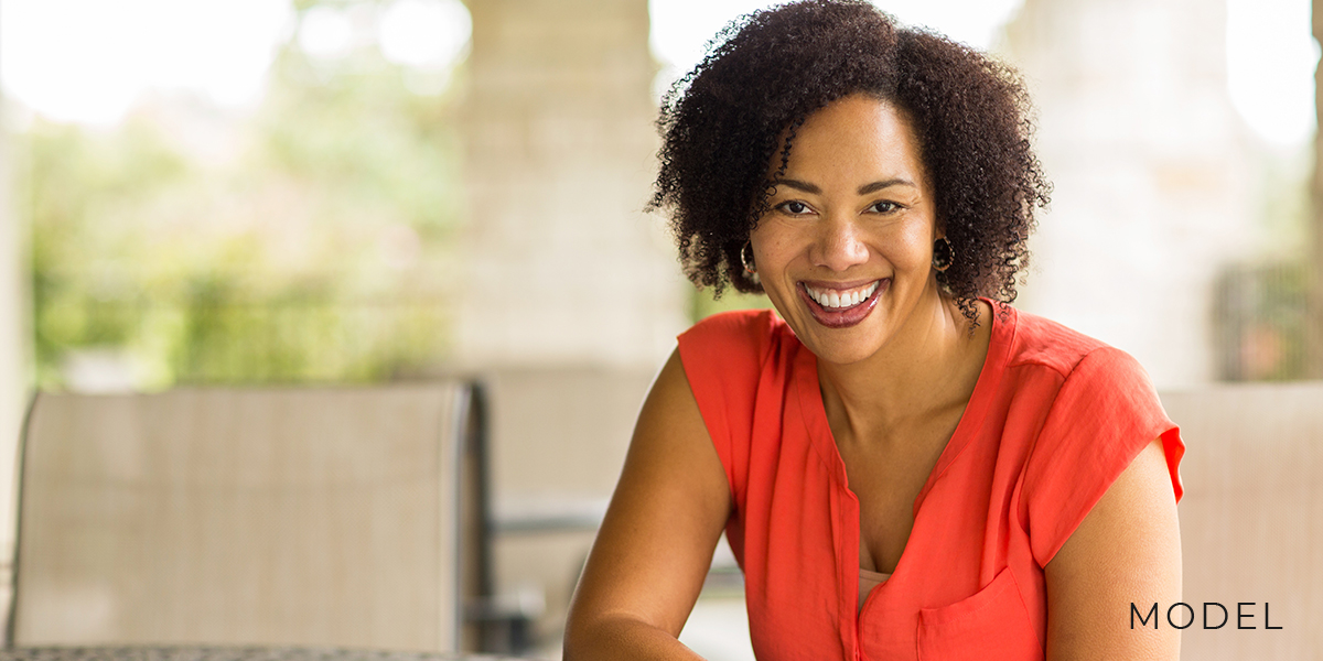 Woman on Her Patio Smiling