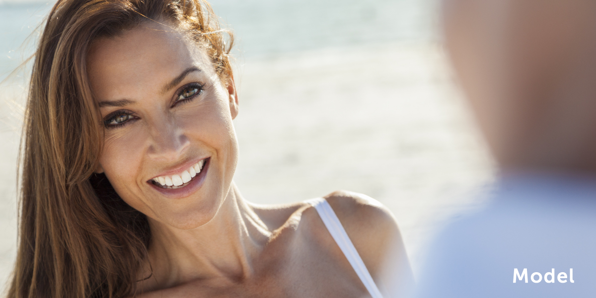 Smiling Model On the Beach