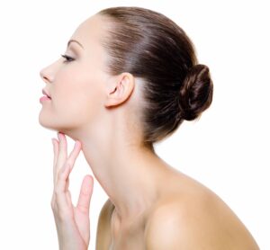 Woman model touching chin | perri dermatology