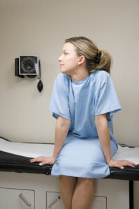 Model in hospital gown